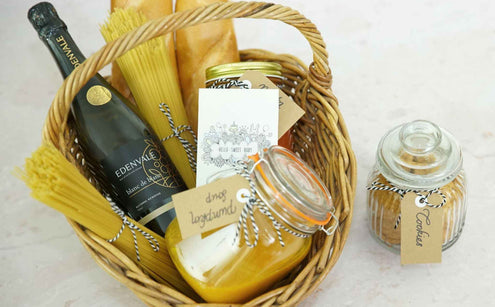 Basket full of food and Blanc de blanc wine