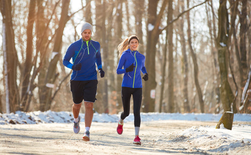 People running in the snow