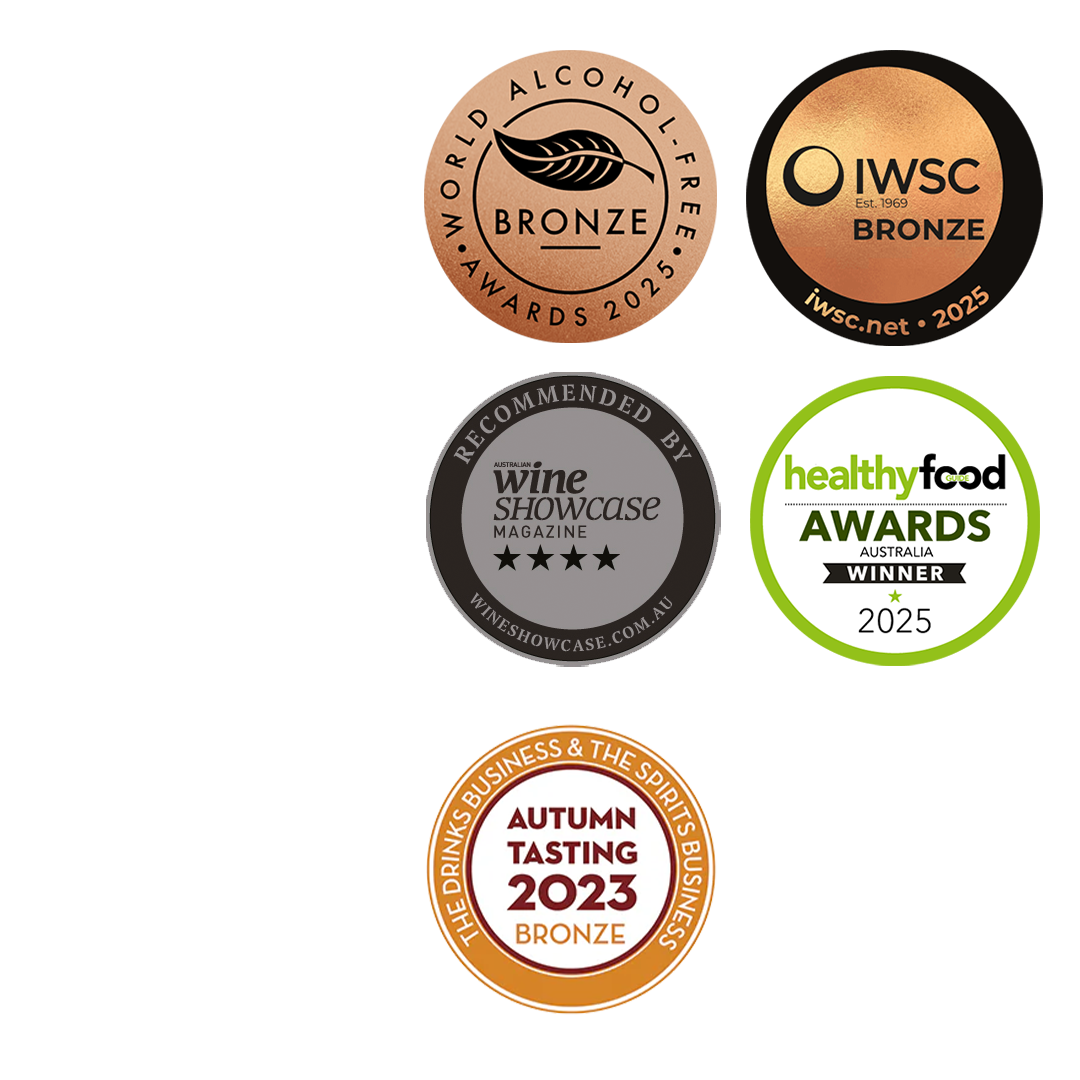 Collection of awards including World Alcohol-Free Bronze Award, IWSC Bronze Award, Wine Showcase Magazine recommendation, Healthy Food Australia Award, and Autumn Tasting 2023 Bronze Award on a white background.