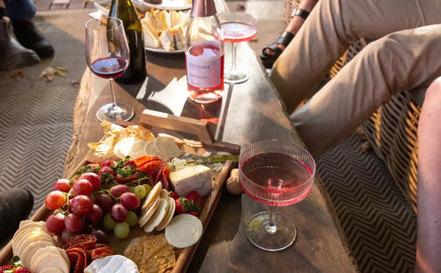Non-alcholic wine and a food plate