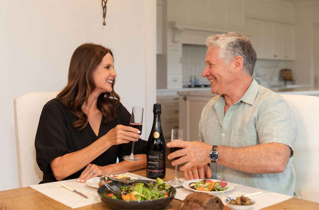 People clinking with red Sparkling Shiraz Wine