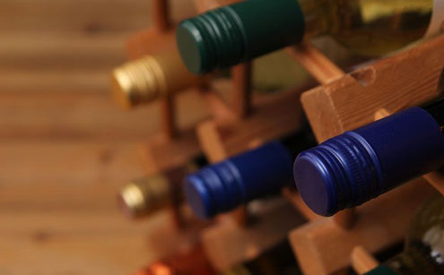 wine rack with wine on it