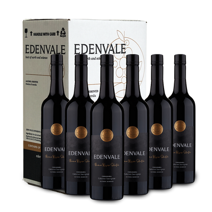 Six bottles of Edenvale Coonwarra Cab Sav with carton in the background 
